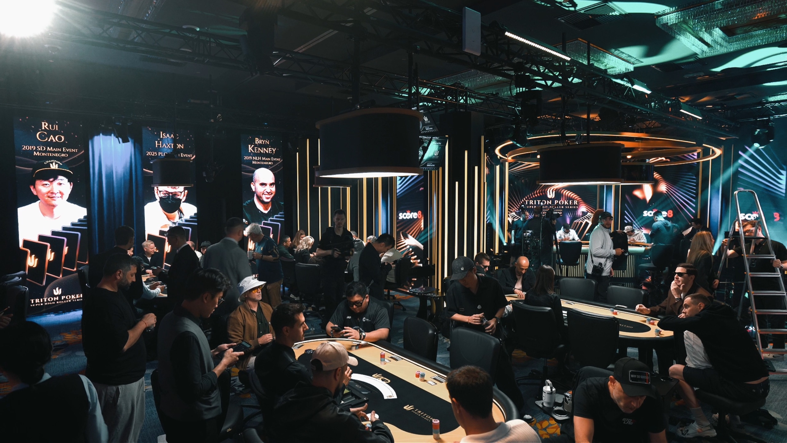 Busy Triton Poker Montenegro tournament room with Score8 branding
