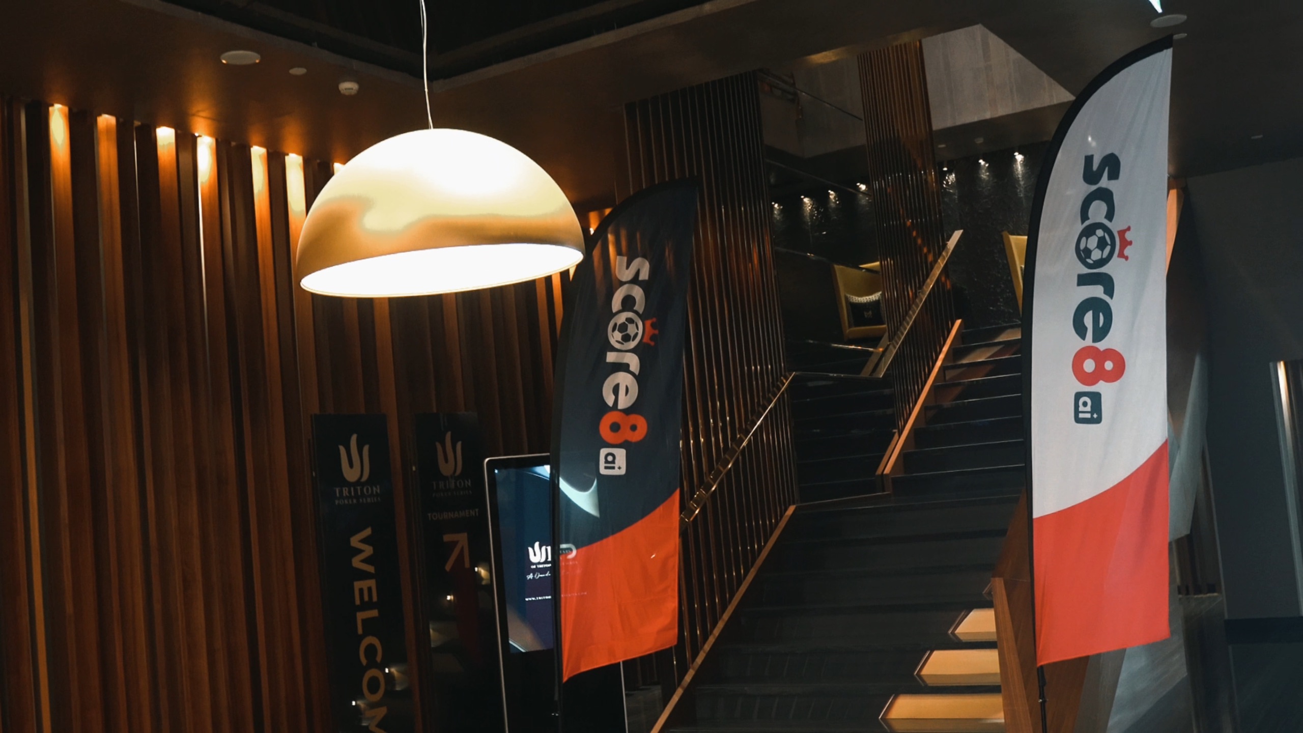 Score8 flags at the Triton Poker Montenegro venue entrance